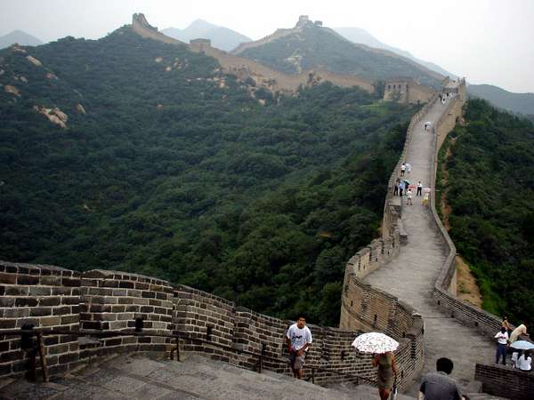 photo of China, Beijing (Peking, Pekin), the Chinese Great Wall crossing the lush country side at Badaling