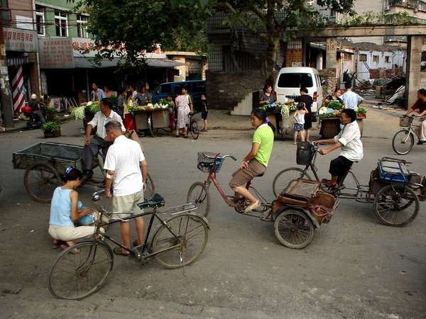 photo of China, Sichuan province, bicycles and market in central Chengdu
