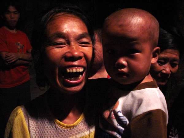 photo of China, Guanxi province, Dong woman with child