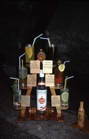 photo of West Cuba, famous Cuban rum coctails on a tower around a bottle of Havana club in a cave in the region of Vinales