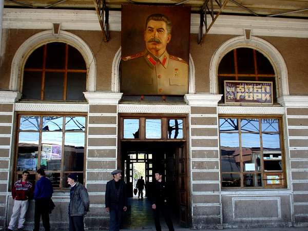 photo of Republic of Georgia, huge color painting of Stalin above the platform of the train station in his birthplace Gori
