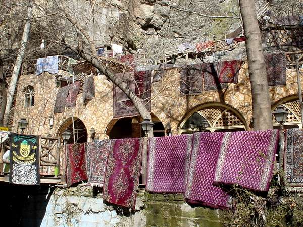 photo of Iran, around Tehran (Teheran), carpets hanging out at one of the numerous tea houses along the mountain path at Tochal