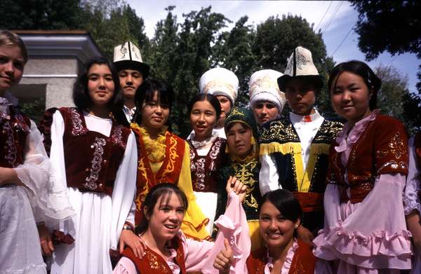 photo of Kyrgyzstan, Osh, Kyrgyz students dressed up in traditional Kyrgyz folkloric costumes for a school festival