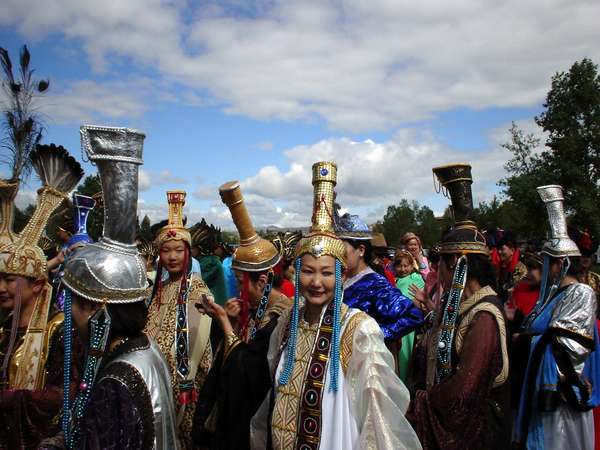 photo of Mongolia, Mongolian actors dressed up in costumes outside the stadium in Ulaan Baatar (Ulaanbaatar, Ulan Bator) for Naadam, the Mongolian National holiday