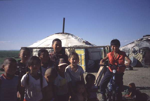 photo of central Mongolia, Mongolian kids in front of yurt camp