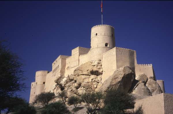 photo of Oman, Nakhal Fort (Nakhl castle) lies at the foot of the north-western edge of the Hajar Mountains below the Jebel Akhdar. It is one of the numerous Omani forts
