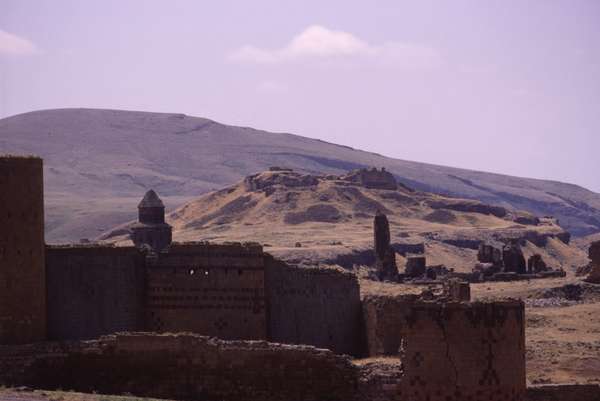 photo of Turkey, around Kars, ruins of the Armenian capital Ani (961 BC). PHOTO of Turkey, around Kars, ruins of the Armenian capital Ani (961 BC). Nowadays a Turkish military camp has been set up among the historical buildings, citadel, churches and monasteries; the two soldiers that guided me around pointed out where they had carved their names into some frescoes.