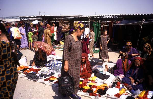 photo of Turkmenistan, around Ashgabat, Turkmen woman on Tolkuchka bazaar market
