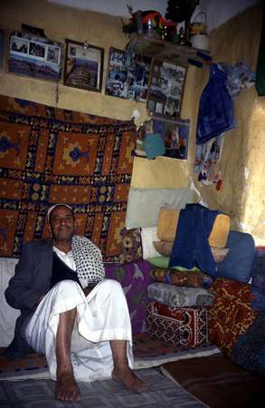 photo of Yemen, Yemeni man and the interior of his house in the capital Sanaa