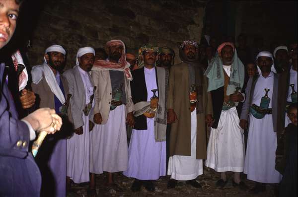 photo of Yemen, village in Hajar mountains, family at a nightly wedding ceremony