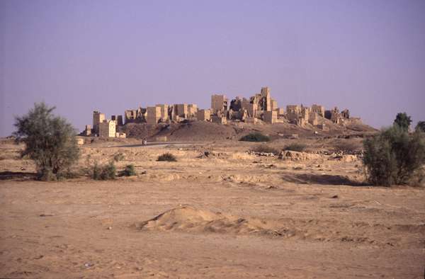 photo of Yemen, overview of Marib (Mareb), the ruïns of the old capital of the Kingdom of Sheba. Some of the ruins of mud brick tower houses on this archeological site have been destroyed during the civil war in the 1960's
