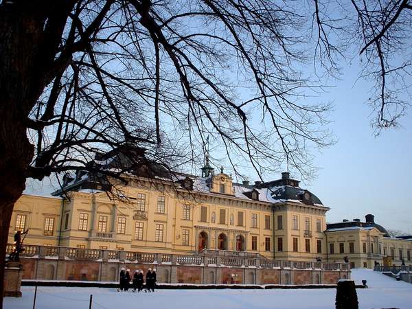 photo of Sweden, Stockholm, guards marching in front of Drottningholm, the royal castle and Swedish Versailles on a sunny winter day 