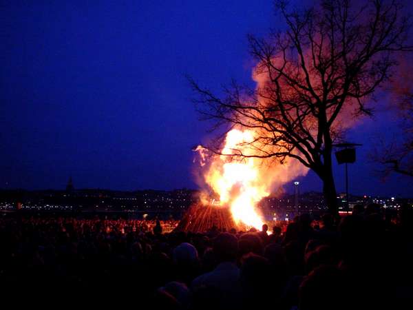 photo of Sweden, Stockholm, huge fire of Walpurgis Night (Valborgsmässoafton, 30 april) at Skansen, this tradition goes back to the Viking spring and fertility celebrations, the Catholics attached this ancient festival to the legend of Saint Valborg, a German nun of the 8th century