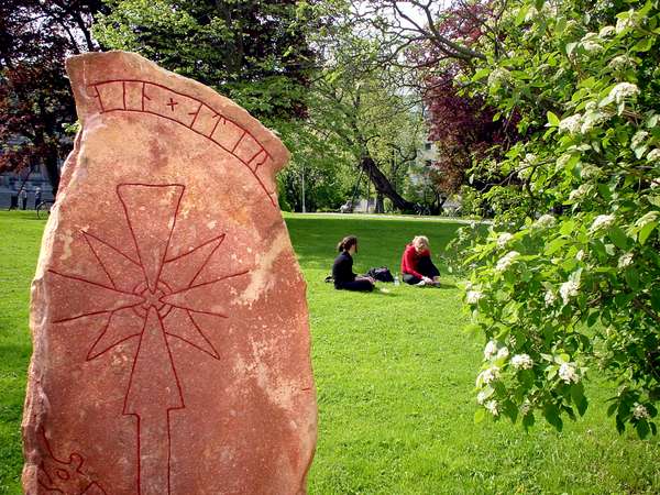 photo of Sweden, Uppsala, rune stone in the park garden of the university