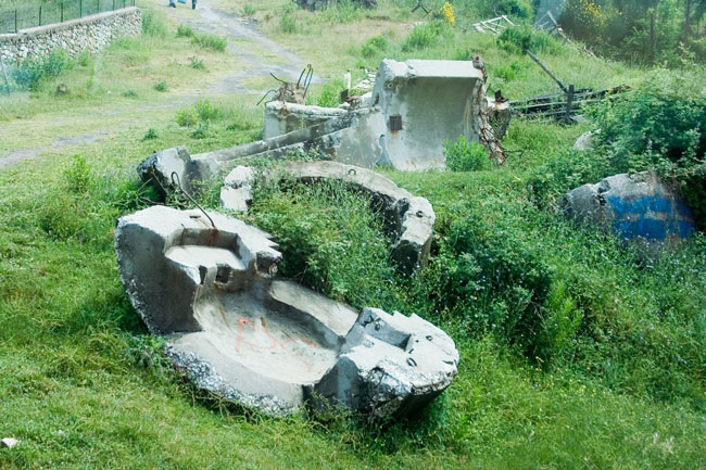 Albania photo: Exploded Communist era defensive Albanian bunkers. Concrete dome shelter - bunker built during Enver Hoxha's rule all over Albania as protection against a foreign invasion. 