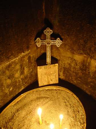 photo of Armenia, cross and candles in Armenian church