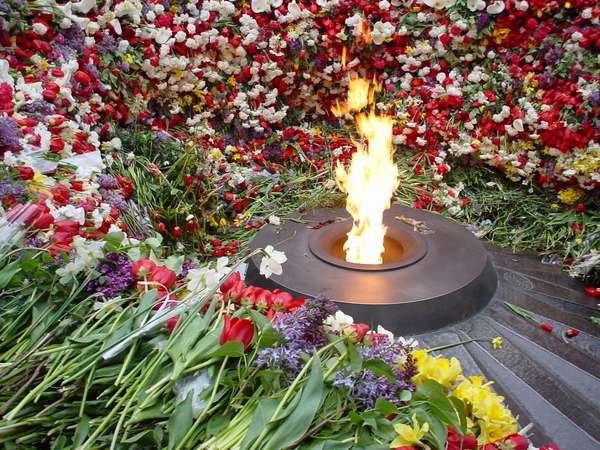 photo of Central Armenia, Yerevan, thousands of flowers around the flame inside the Genocide monument, commemmorating on 24 april the Armenian genocide of 1915