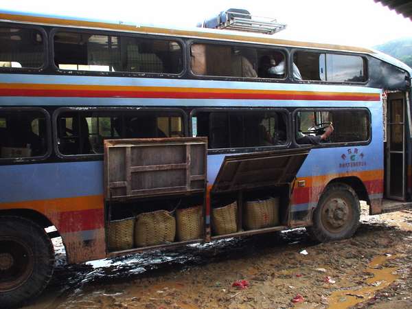 photo of China, Guizhou province, road although transport between large Chinese cities can be very luxurious, the sleeper buses (up to 50 people have a bed in them) can get very rough