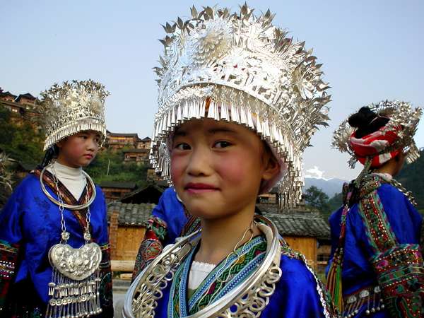 photo of China, Guizhou province, Miao girl of folklore group in traditional ethnic Miao costume