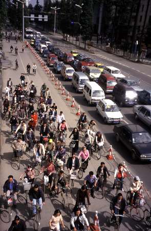 photo of China, Beijing (Peking, Pekin), there is so much bicycle traffic that bicycles need a separate lane