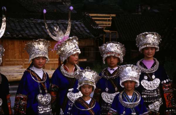 photo of China, Guizhou province, Miao girls of folklore group in traditional ethnic Miao costume