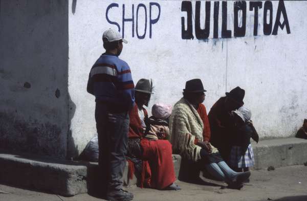 photo of Ecuador, Andes, Quechua highland indians in front of a shop in Quilotoa