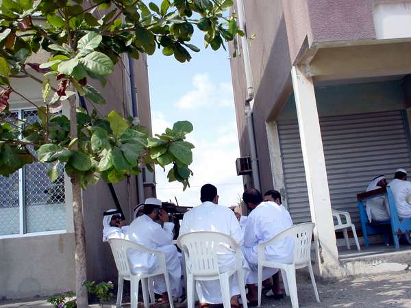 photo of United Arab Emirates, Fujairah, Emirati Arabs having tea time