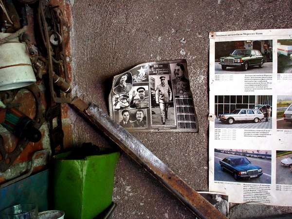 photo of Republic of Georgia, detail of a wall in a Georgian farmhouse with pictures of Stalin