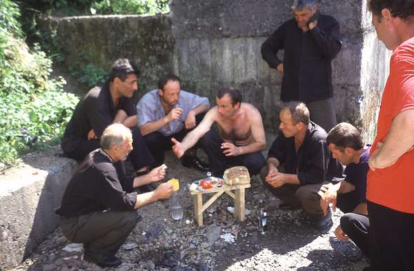 photo of Republic of Georgia, Svaneti, Svans having a little keipe along the road on the way from Zugdidi to Mestia