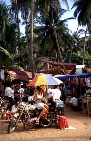 photo of India, Goa, flea market on Anjuna beach, where you can buy home made souvenirs from old but still colorful hippies