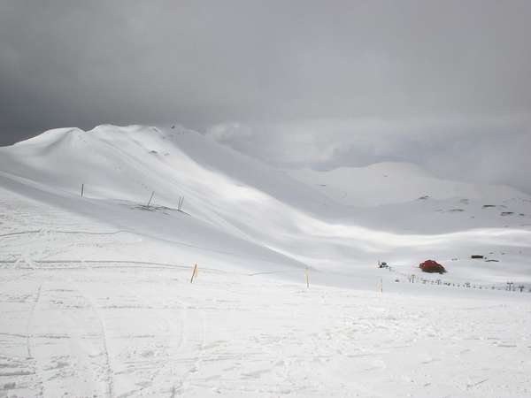 photo of Iran, around Tehran (Teheran), after a almost 8 km long cable car ride on top of the snowy mountain besides Tehran there is this ski resort of Tochal (Touchal), which was still open in april when this picture was taken