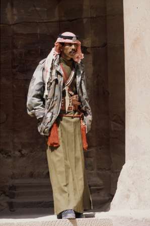 photo of Jordan, Jordanian desert guard in the Nabatean city of Petra, the rose red city, located just outside the town of Wadi Mousa in southern Jordan, 260 kilometers from Amman via the Desert Highway