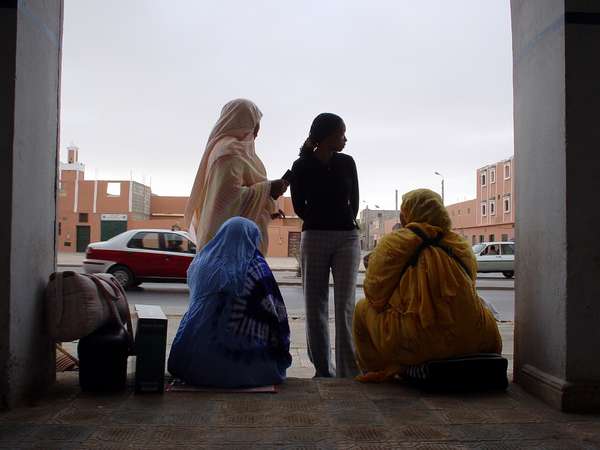 photo of Morocco, Western Sahara, Laayoune, Saharian women waiting for the bus
