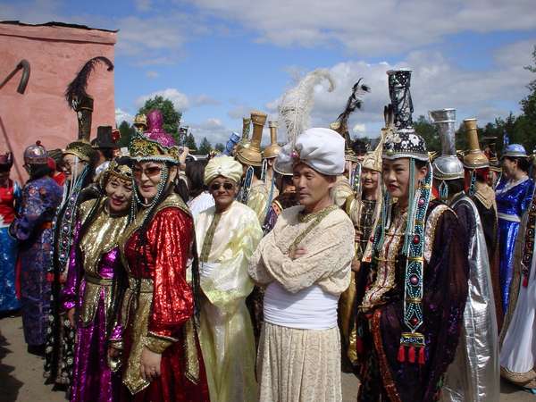 photo of Mongolia, Mongolian actors dressed up in costumes outside the stadium in Ulaan Baatar (Ulaanbaatar, Ulan Bator) for Naadam, the Mongolian National holiday