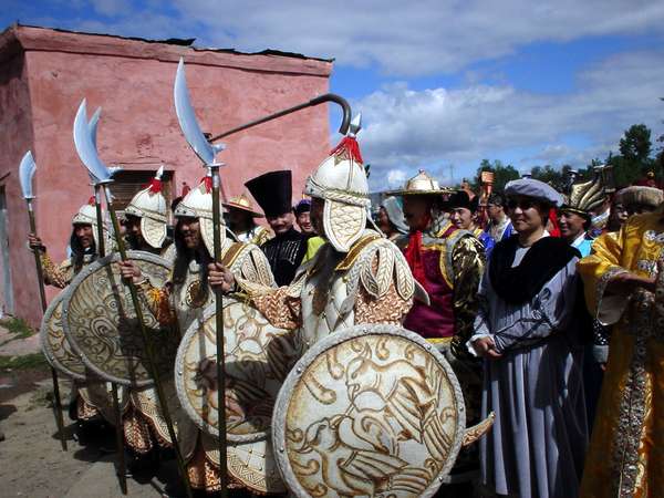 photo of Mongolia, Mongolian actors dressed up in costumes outside the stadium in Ulaan Baatar (Ulaanbaatar, Ulan Bator) for Naadam, the Mongolian National holiday