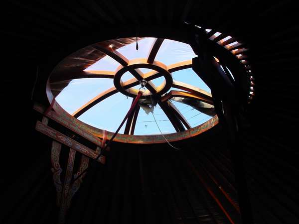 photo of Mongolia, detail of the wooden hole in the roof of a Mongolian nomad yurt