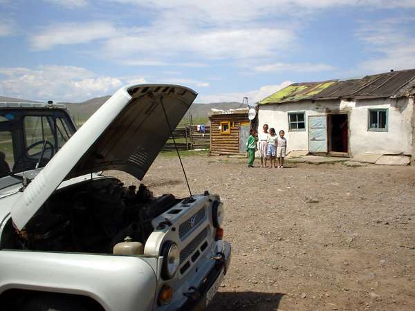 photo of Mongolia, Russian UAZ jeep making a stop on a roadside snack bar along the track to Terkhiin Tsagaan Nuur (white lake)