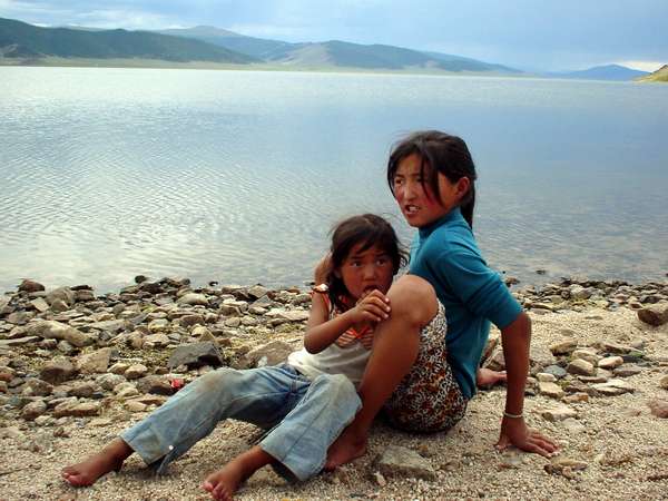 photo of Mongolia, two Mongolian girls at the borders of Terkhiin Tsagaan Nuur (the white lake)