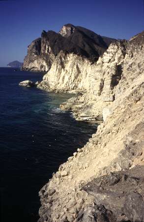 photo of South Oman, West of Salalah, along the road towards the the Yemeni border, Mughsail, The Whale's Mouth, limestone rocks and sea blowholes