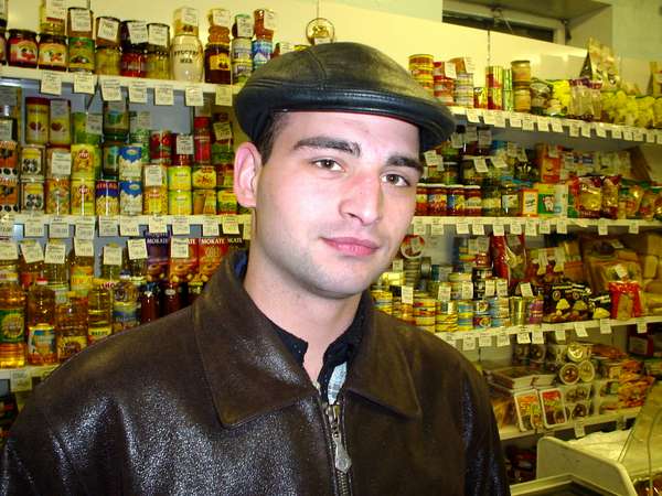 photo of Russia, Vorkuta, young Russian mine worker in grocery store