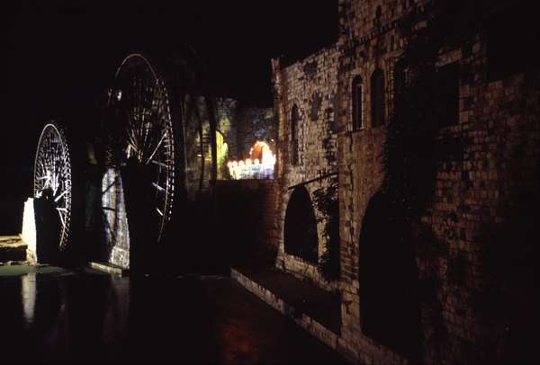 photo of Syria, around Homs, Hama, ancient Norias (waterwheels) on the Orontes River, these old water wheels bring water up from the Orontes for irrigation