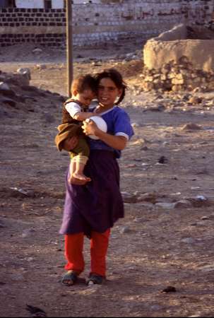 photo of Syria, village around Aleppo, Syrian girl and child