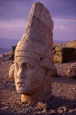 photo of Eastern Turkey, around Malatya, Nemrut Dagi (Nemrud Dag, Nemrut Dag), mountain top (2150 m) shrine with tumulus, stone heads and god statues of the pre-Roman king Antiochus and mythological figures