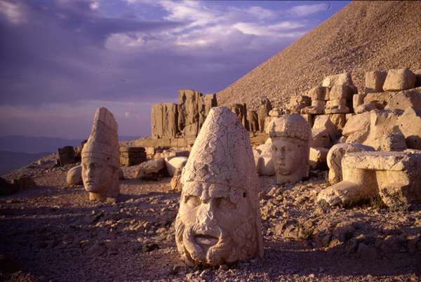 photo of Eastern Turkey, around Malatya, Nemrut Dagi (Nemrud Dag, Nemrut Dag), mountain top (2150 m) shrine with tumulus, stone heads and god statues of the pre-Roman king Antiochus and mythological figures