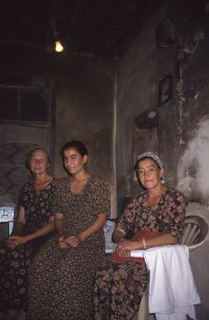 photo of Turkmenistan, around Darvaza, Turkmen women in a truck stop - chaihana in the middle of the Kara Kum desert