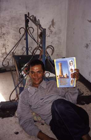 photo of Turkmenistan, Kara Kum desert, Turkmen man with cradle