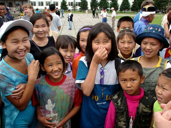 photo of Tuva, Kyzyl, Tuvan school children in front of the theatre