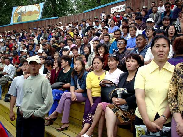 photo of Tuva, Kyzyl, Tuvan public in the stadium attending a traditional wrestling match