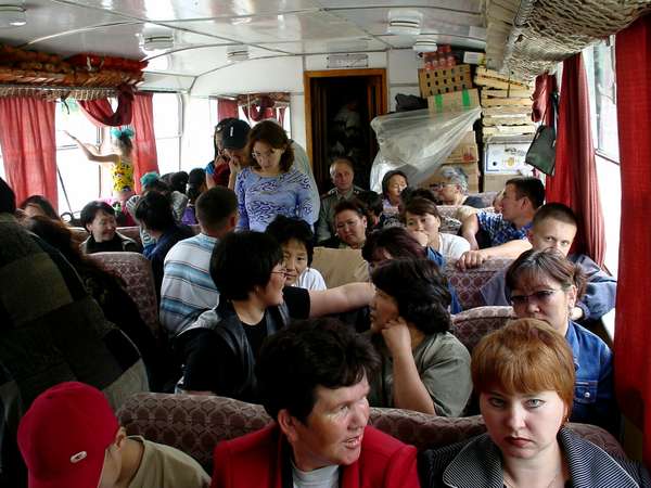 photo of Tuva, on the Yenisey (Yenisei) river, inside the ferry boat from Kyzyl to Toora Chem (Toora-Xem, Toora-Khem), a village in the Tuvan Siberian taiga woods, which is only reachable by this speed boat (12 hours upstream) or helicopter