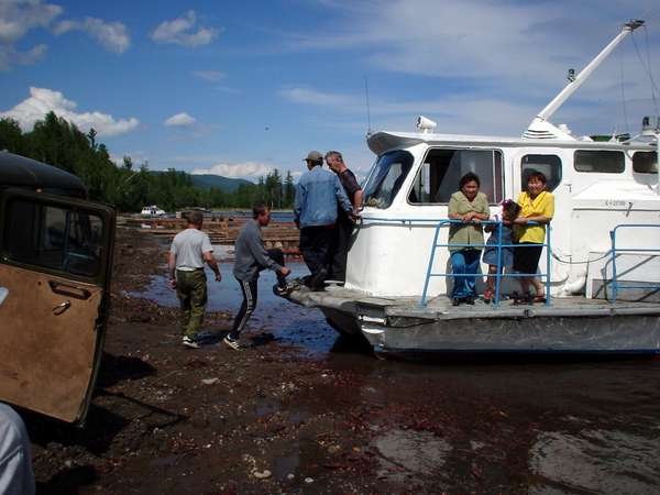 photo of Tuva, on the Yenisey (Yenisei) river, the ferry boat from Kyzyl to Toora Chem (Toora-Xem, Toora-Khem) has moored on the river bank of a tiny village along the stream